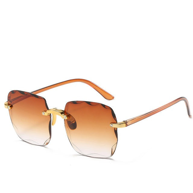 Lightweight vintage rimless sunglasses with stylish lenses and UV400 protection for unisex fashion.