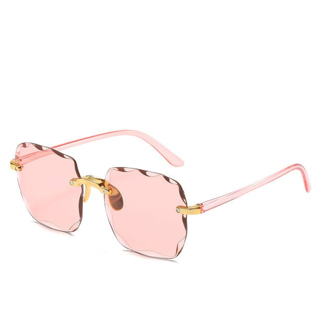 Versatile unisex vintage rimless sunglasses, perfect for any trendy summer outfit with UV400 eye protection.