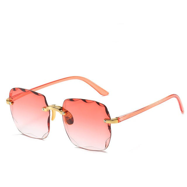 Modern take on vintage: unisex rimless sunglasses with UV400, a stylish and lightweight fashion accessory.