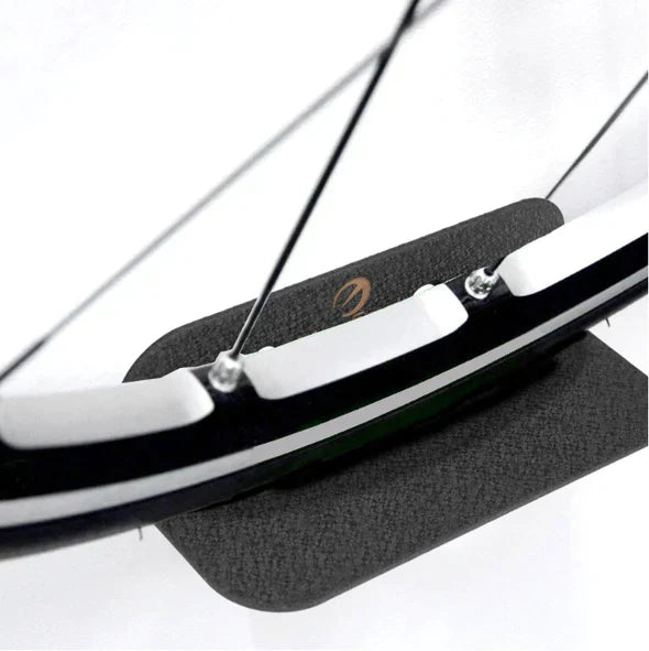 Vertical bike rack for space-saving storage. Unisex design, durable carbon steel construction.
