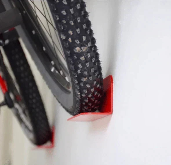 Unisex vertical bike storage solution. Wall-mounted hanger for garage & home organization.