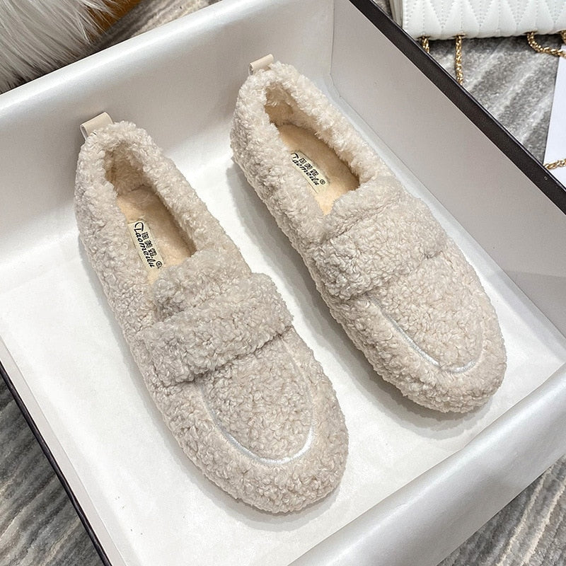 Cozy unisex house slippers, designed for ultimate comfort and warmth during winter.