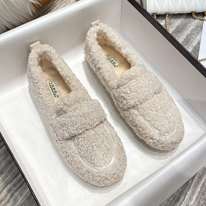 Cozy unisex house slippers, designed for ultimate comfort and warmth during winter.