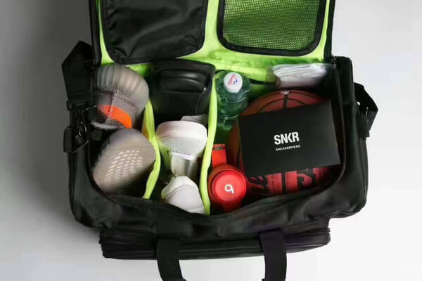 Unisex water-resistant sports & travel bag, designed with compartments for sneakers & active gear.
