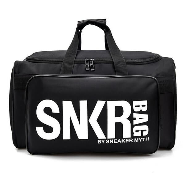 Sleek water-resistant sneaker bag with separate shoe storage & gear compartments for easy travel.