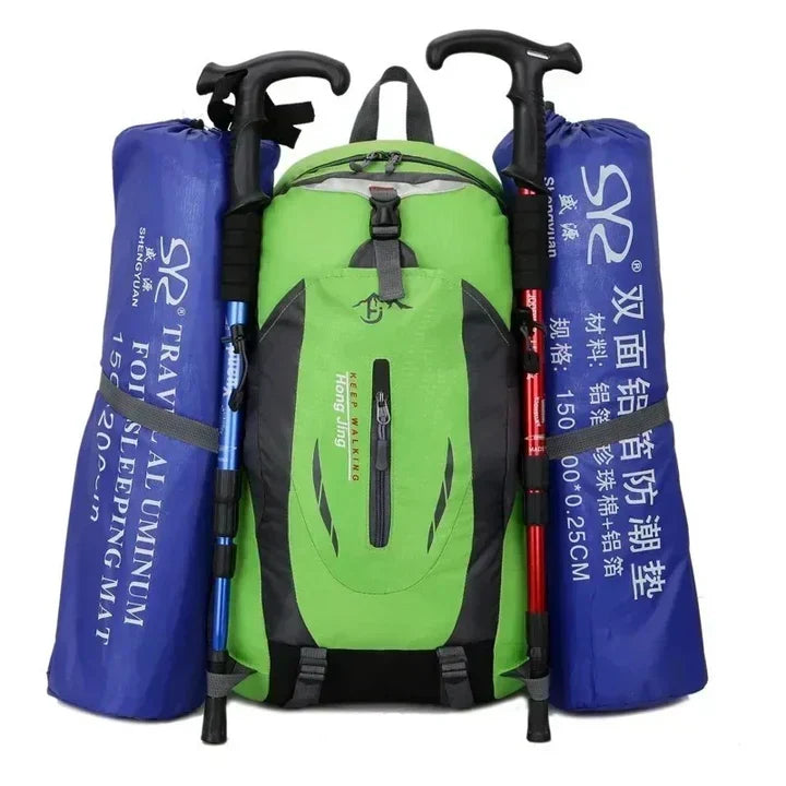 Spacious waterproof adventure backpack packed, showcasing multiple compartments for organized travel.