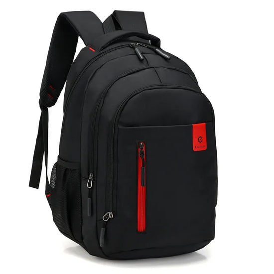 Person wearing a waterproof travel backpack in an outdoor setting, ready for adventure; durable & organized.