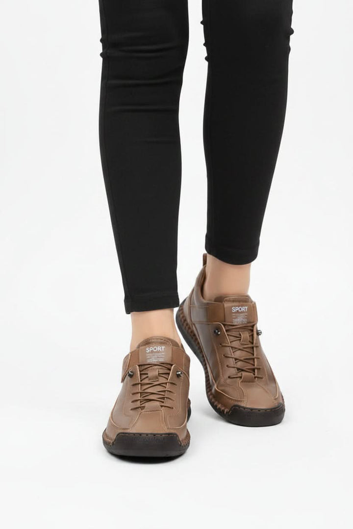 Side profile of lightweight unisex walking shoes. Wide fit, cushioned for ultimate comfort.