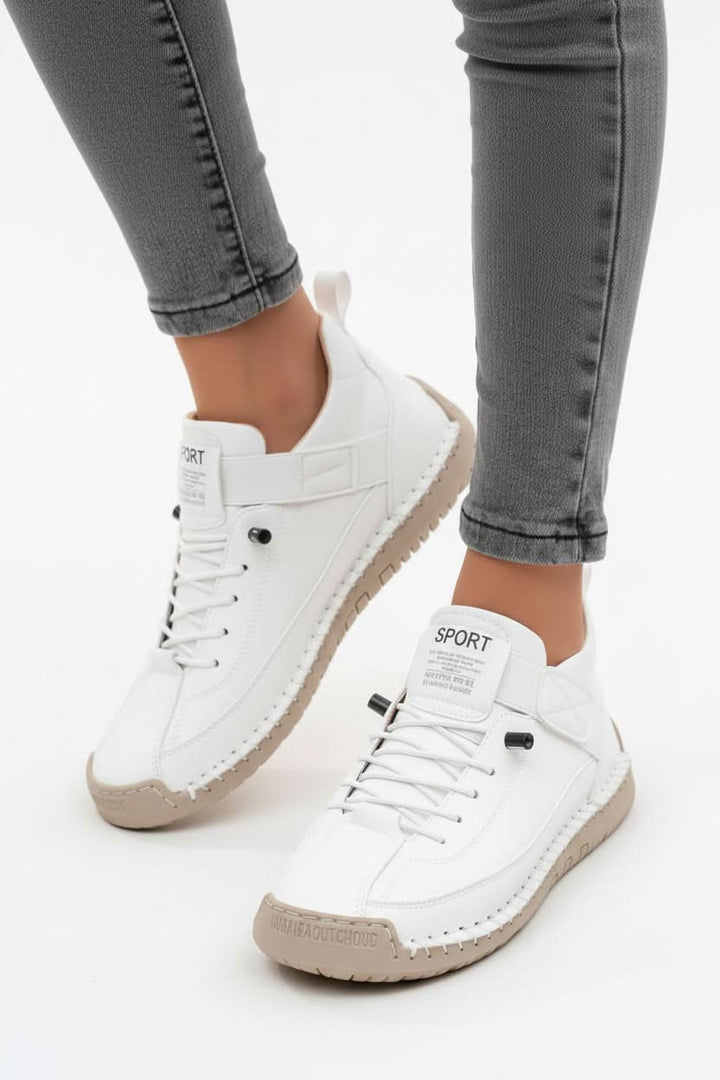 Sole view of durable unisex walking shoes. Cushioned for support & suitable for everyday wear.