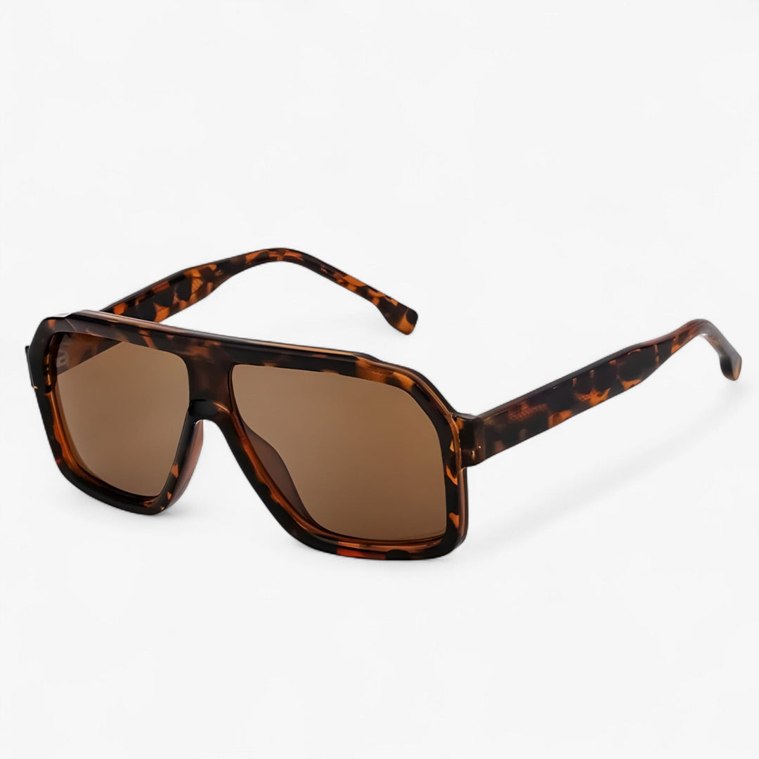 Bold unisex oversized punk sunglasses. Windproof and UV400 protection for edgy festival and street style.