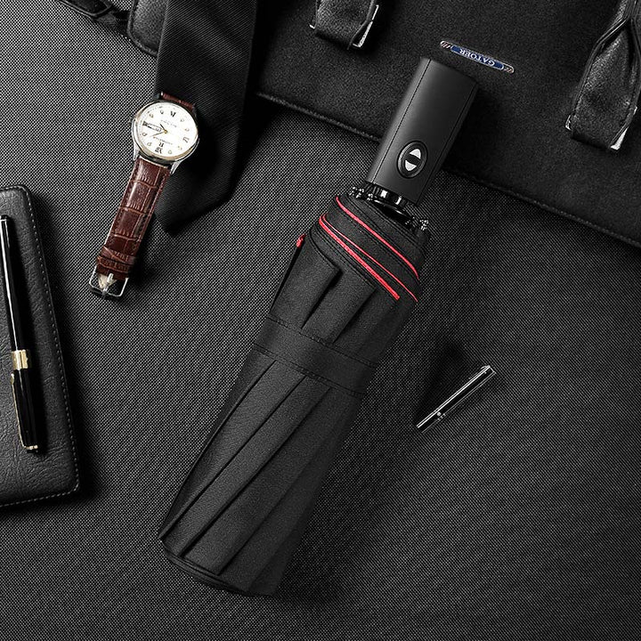 High-quality windproof travel umbrella, ensuring dry comfort in sudden downpours & strong winds.