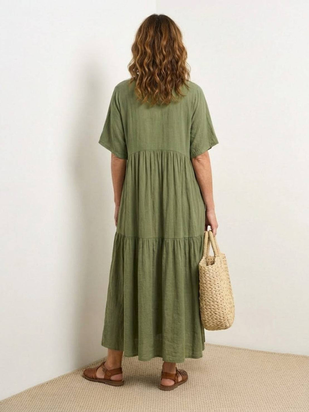 Resort wear V-neck tiered maxi dress for women, elegant & breezy bohemian style.