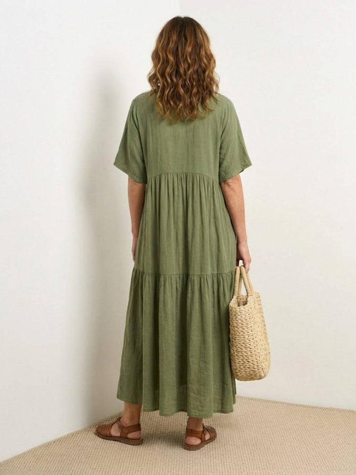 Resort wear V-neck tiered maxi dress for women, elegant & breezy bohemian style.