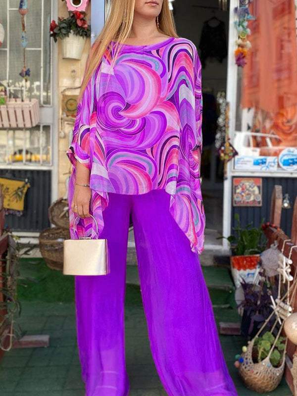 Women's elegant abstract print batwing top & wide leg pant set, ideal for summer fashion and comfortable wear.
