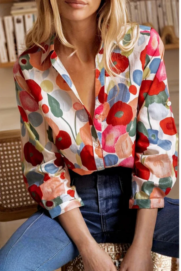 Vibrant floral long sleeve button-down blouse for women, featuring a relaxed fit. Ideal for spring & summer casual style.