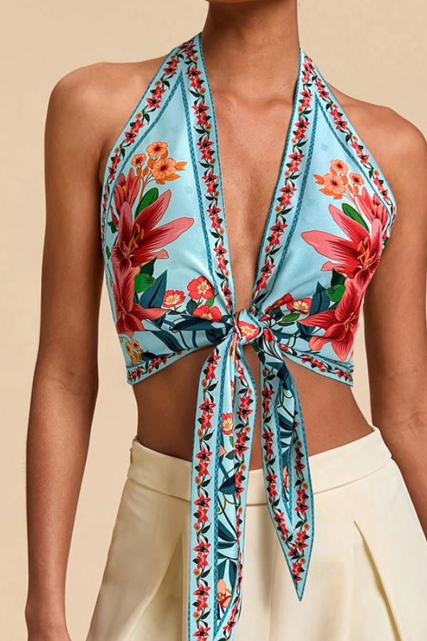 Modern sleeveless floral halter top. Trendy summer look for women's casual wear.