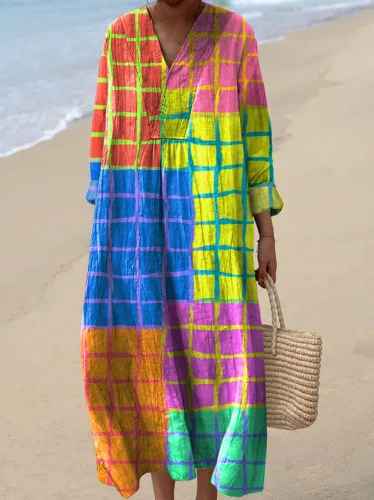 Women's statement patchwork maxi dress with a bohemian flair. Colorful and comfortable for elegant casual summer wear.