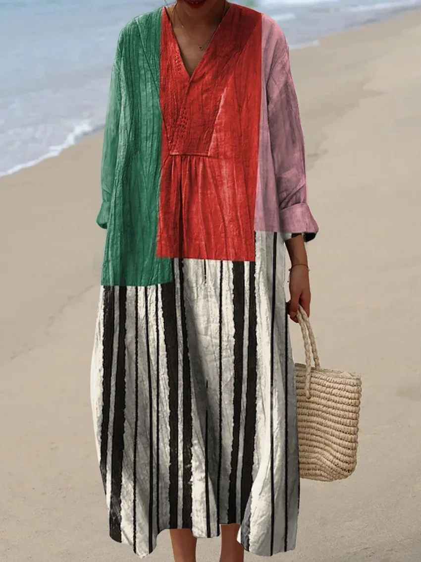 Detailed vibrant patchwork long-sleeve maxi dress. Bohemian V-neck for women's elegant casual summer fashion.