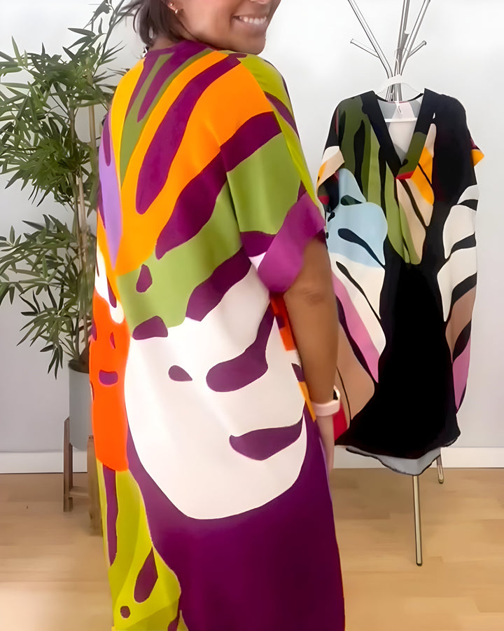 Women's casual abstract print V-neck shift dress. Short sleeve, relaxed fit, and vibrant, great for everyday fashion.