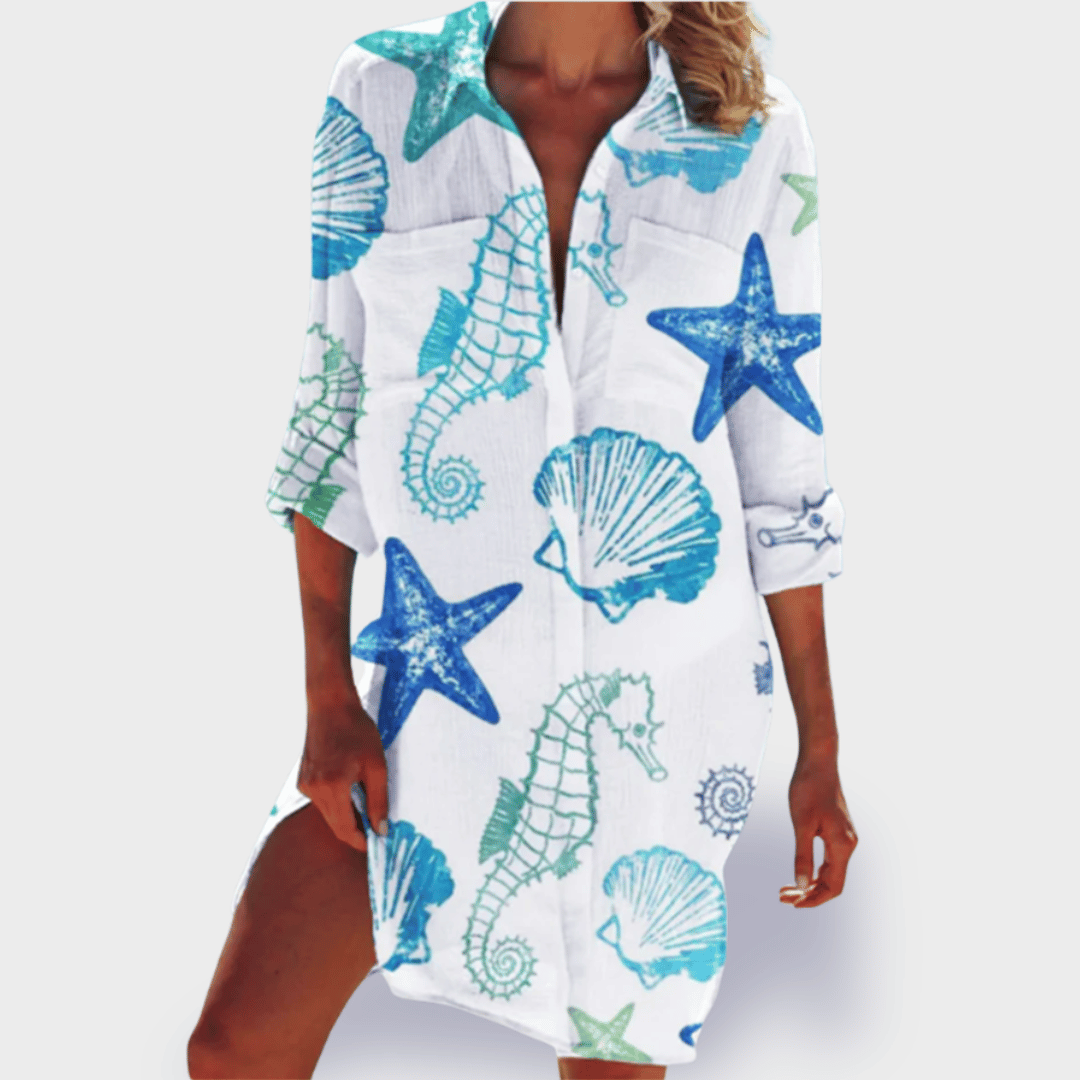 Comfortable women's flowy draped dress in a vibrant, colorful design. Ideal for casual elegance.