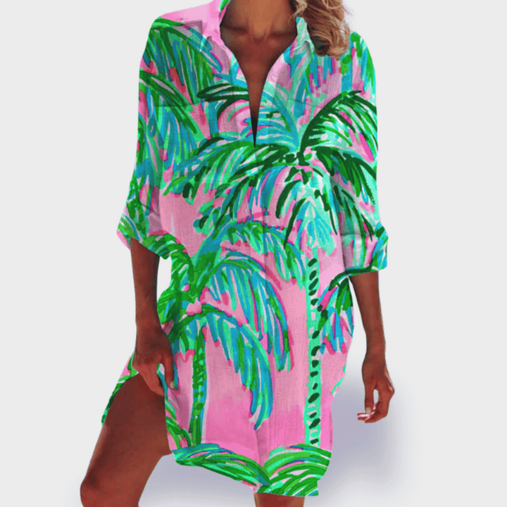 Flattering vibrant women's flowy draped dress. Comfortable, colorful, and perfect for summer elegance.