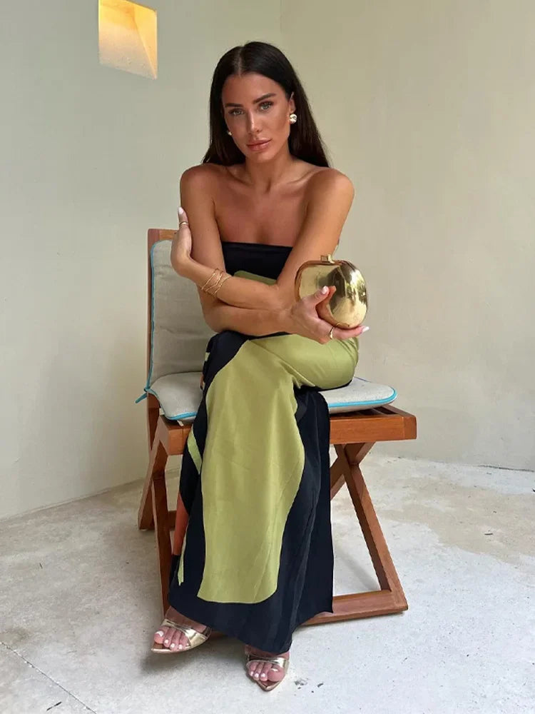 Flowy off-shoulder maxi dress for women, ideal for casual summer outfits and vibrant holiday vibes.