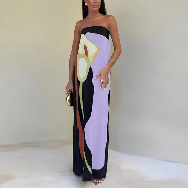Vibrant women's holiday maxi dress with a stunning print, perfect as a comfortable and casual beach dress.