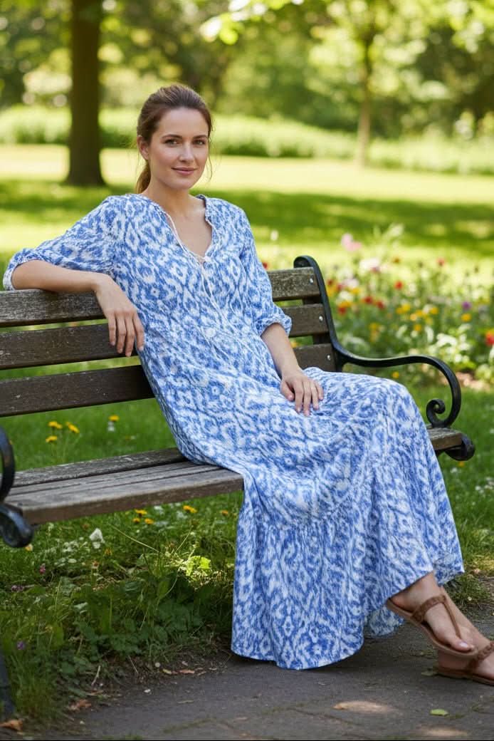 Flowy sleeveless maxi dress for women, vibrant summer style, ideal as a casual beach or vacation dress.