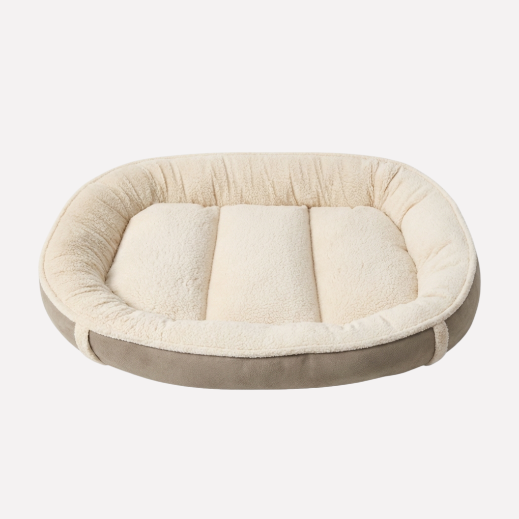 Cozy washable pet nest bed. Plush comfort for dogs, featuring a removable cover & non-slip design.