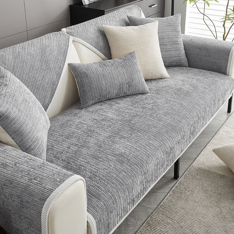 Waterproof sofa cover protects your couch from spills, pets & wear. Non-slip design for living room furniture.