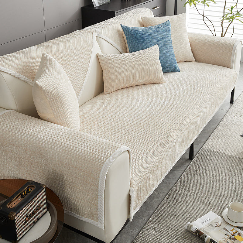 Pet-friendly waterproof couch cover, non-slip sofa protector. Keep your furniture safe from pet messes & spills.