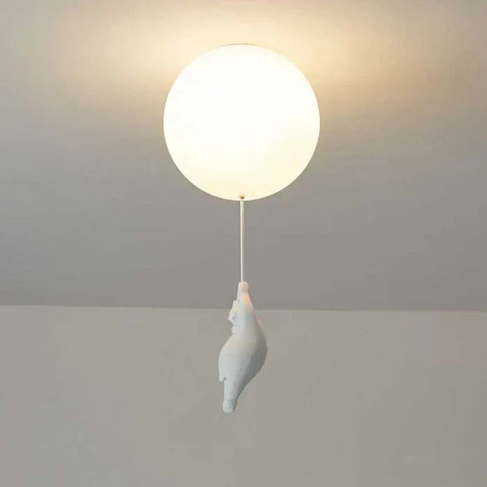 Whimsical bear and balloon ceiling lamp, perfect for creating a dreamy atmosphere in kids' rooms.