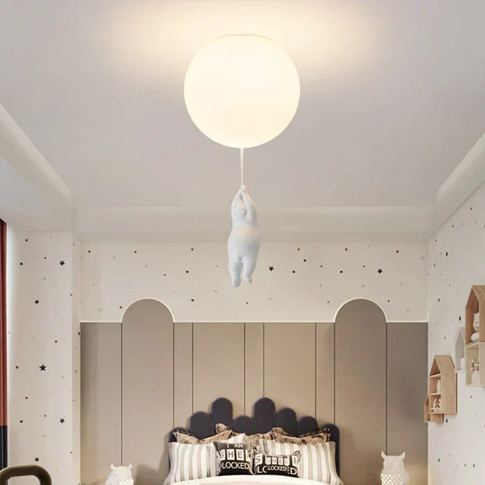 Playroom lighting: charming bear & balloon ceiling lamp. Adds a cute touch to children's space.