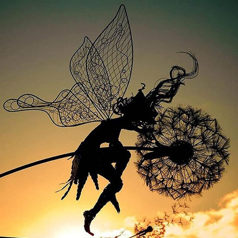 Metal dancing fairy garden stake, whimsical outdoor ornament for enchanting lawn & patio decor.