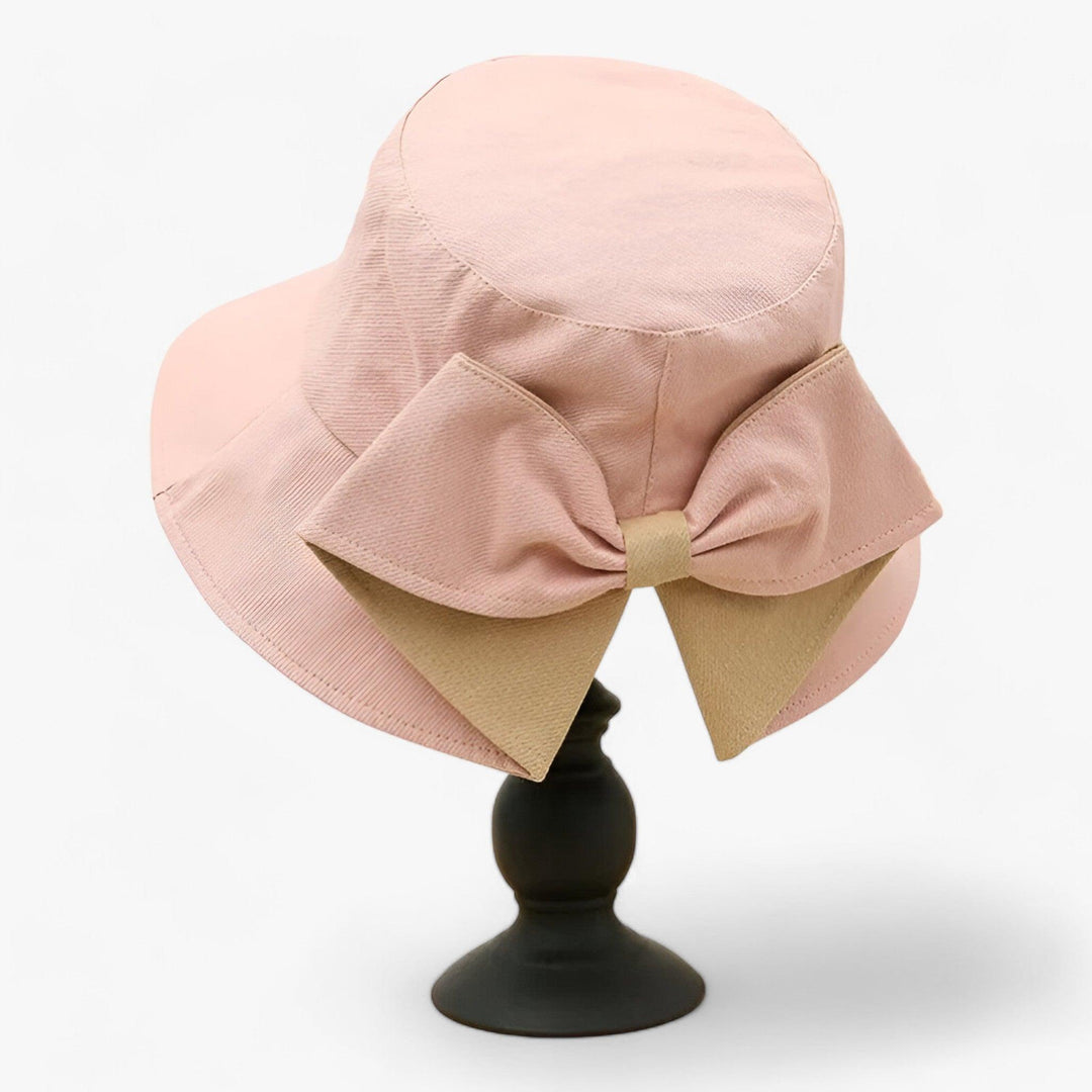 White breathable cotton women's outdoor sun hat for UV protection.