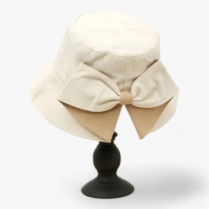 Stylish & breathable white cotton women's bucket hat, great for summer casual wear.