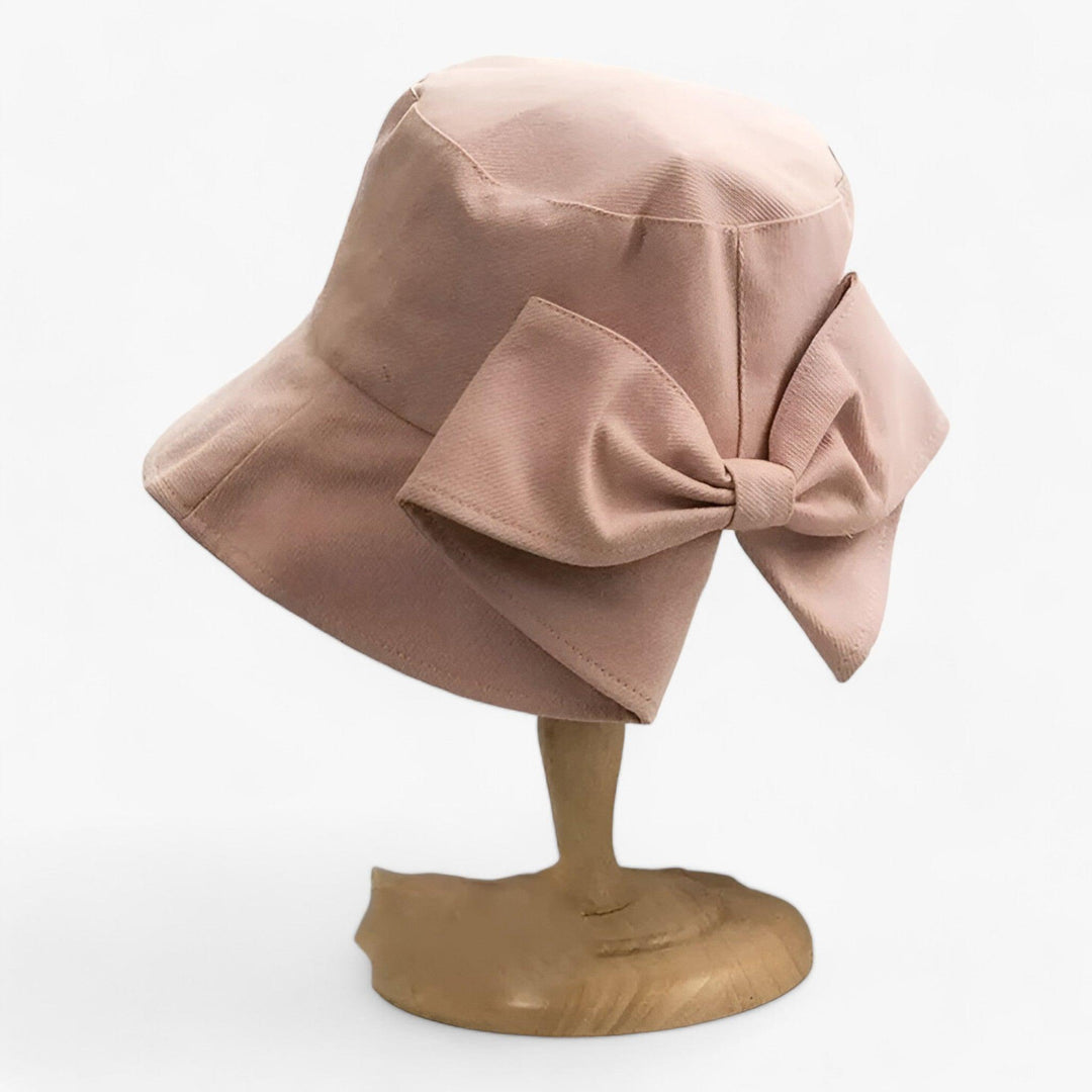 White cotton women's outdoor sun hat, casual, breathable, essential summer accessory.