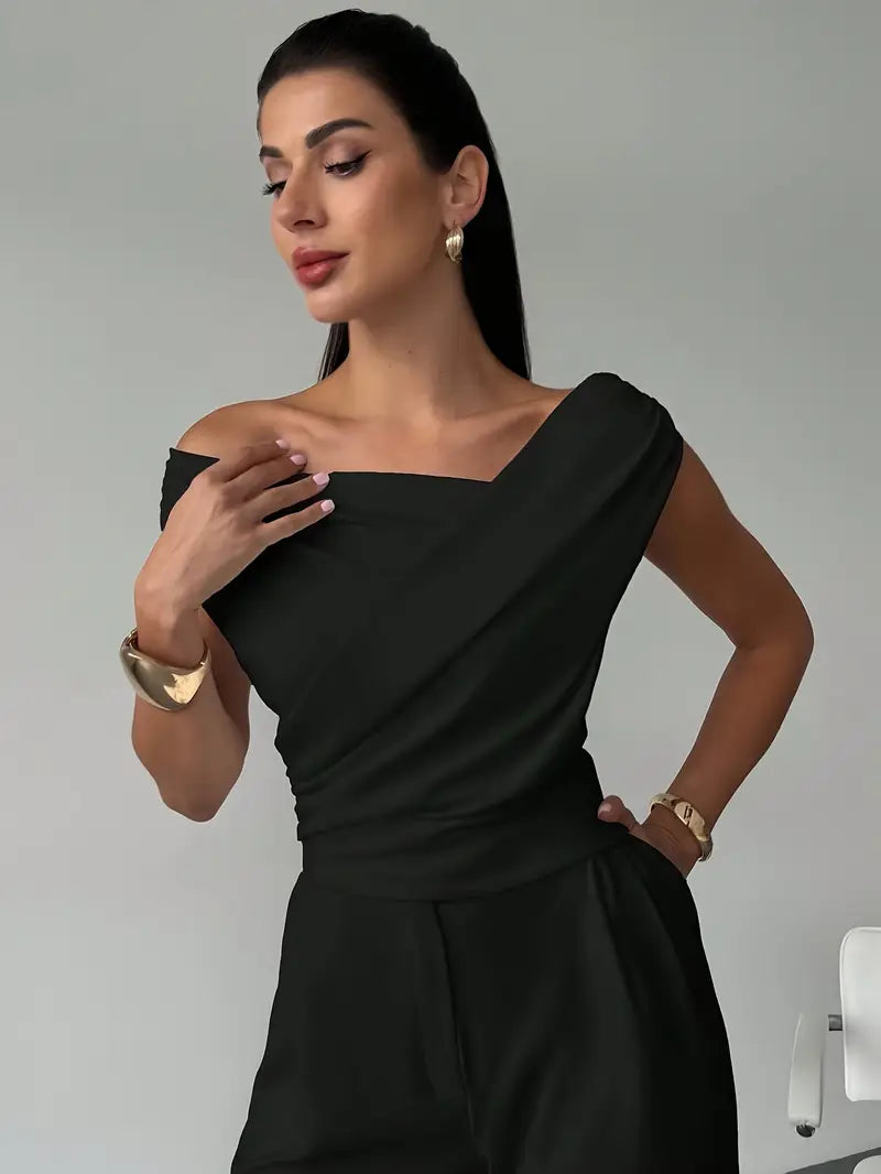 Chic red women's blouse with a flattering draped shoulder, perfect for evening wear.