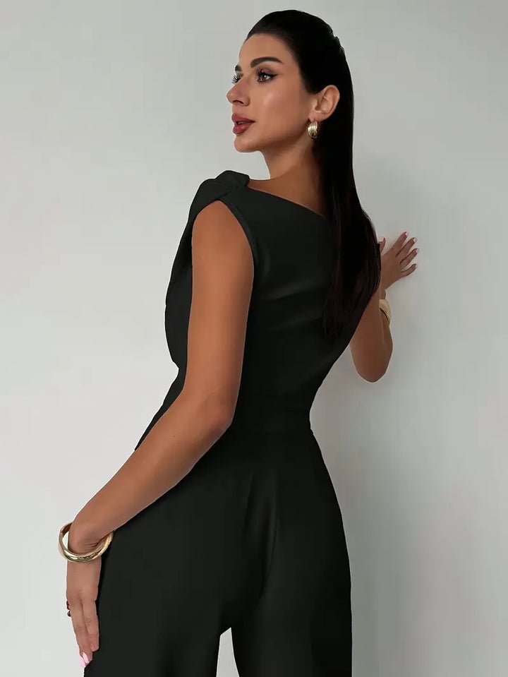 Elegant women's red top, featuring a stylish draped shoulder for a modern look.