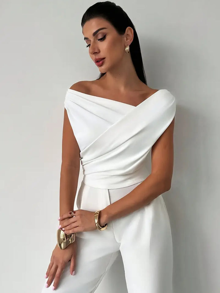 Women's draped shoulder top in white, offering an effortless chic and sophisticated look.