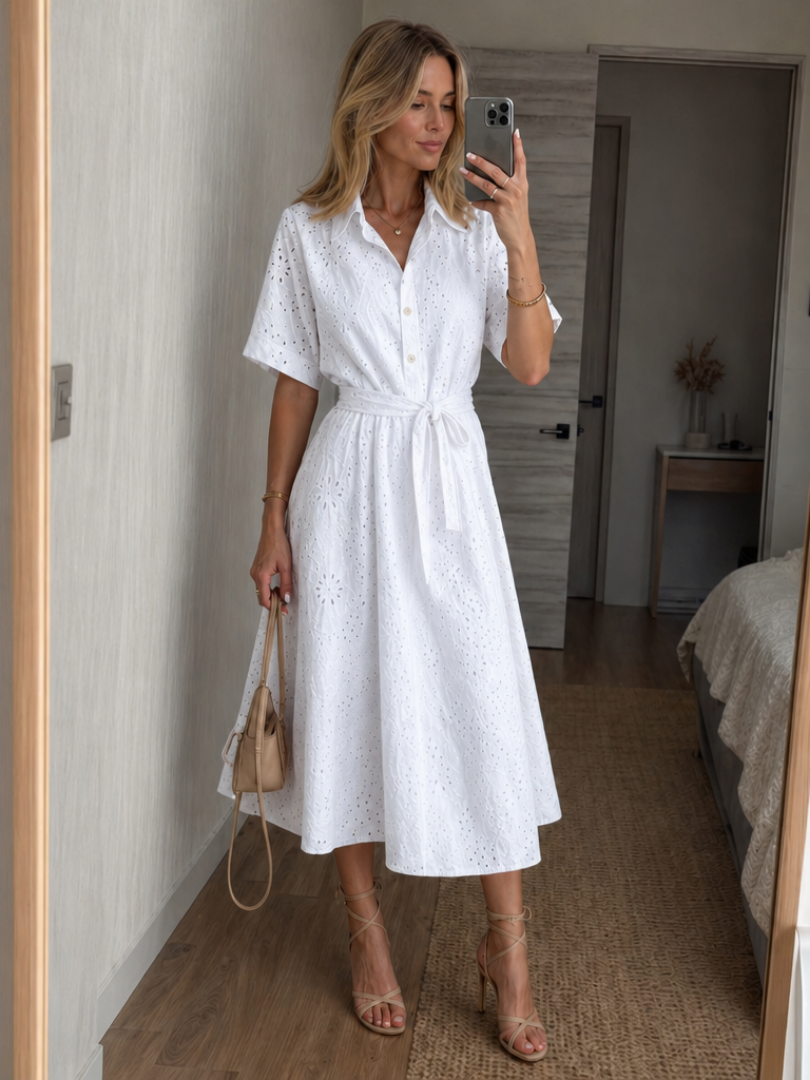 White eyelet midi dress for women, collared with a chic tie waist. Perfect breathable summer day dress.