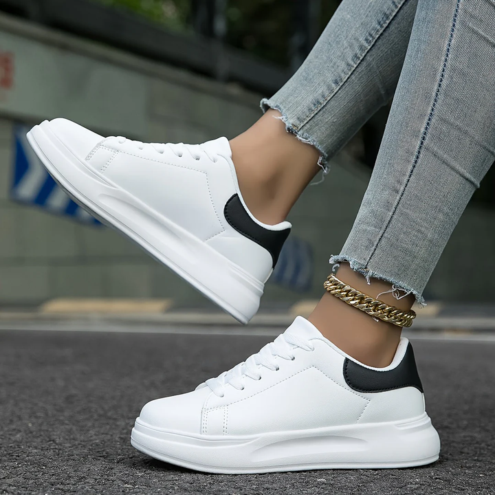 Comfortable women's lace-up platform sneakers, ideal for daily wear and athletic casual style.
