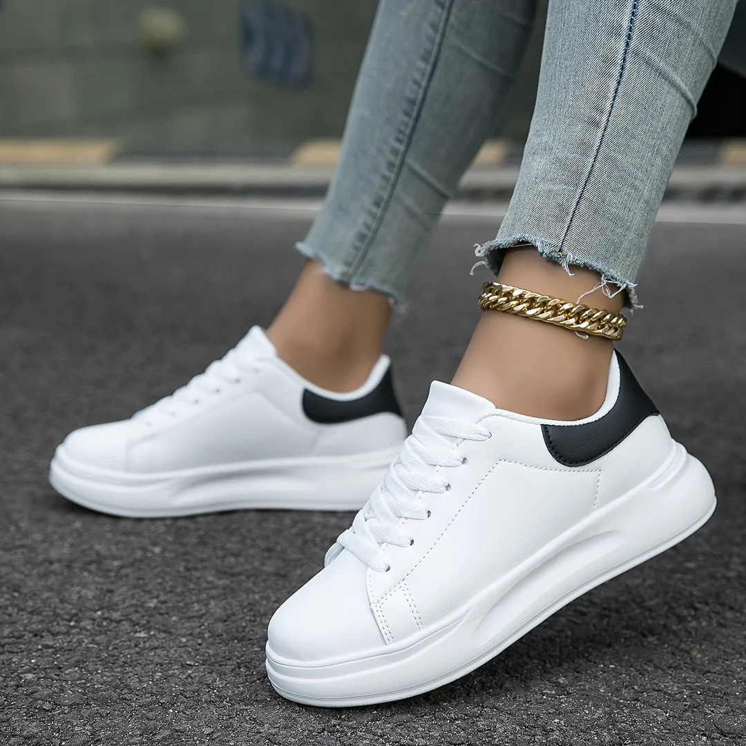 Chic women's platform lace-up shoes, versatile white sneakers for modern casual fashion.