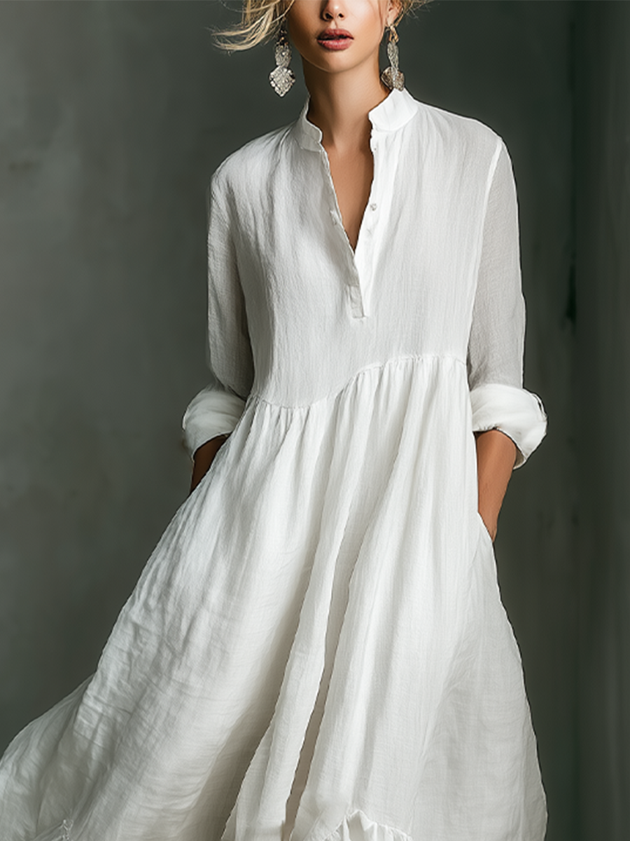 Flowy white long sleeve tiered maxi dress with stand collar. A chic day dress for women's summer vacation & beachwear.