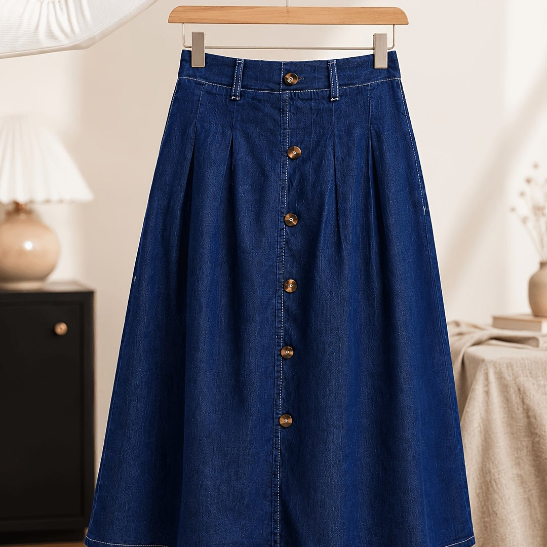 Modern women's medium blue midi A-line skirt with prominent button front. A versatile piece for any wardrobe.