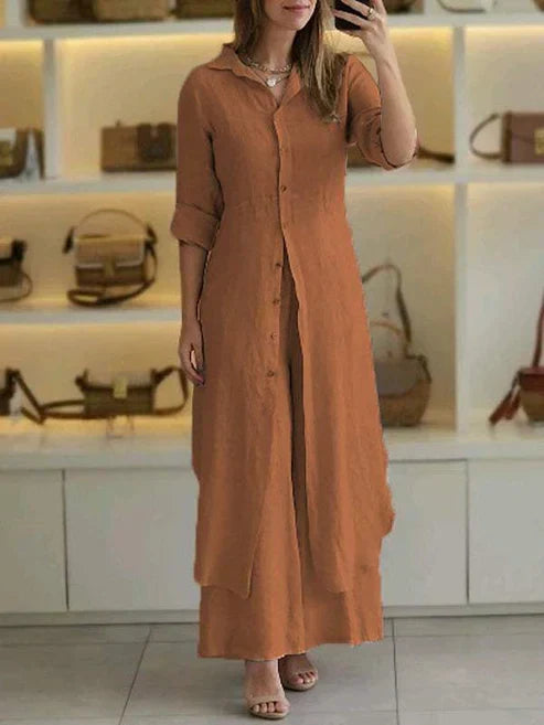 Chic women's button-down maxi dress with 3/4 sleeves, offering a sophisticated & relaxed summer style.