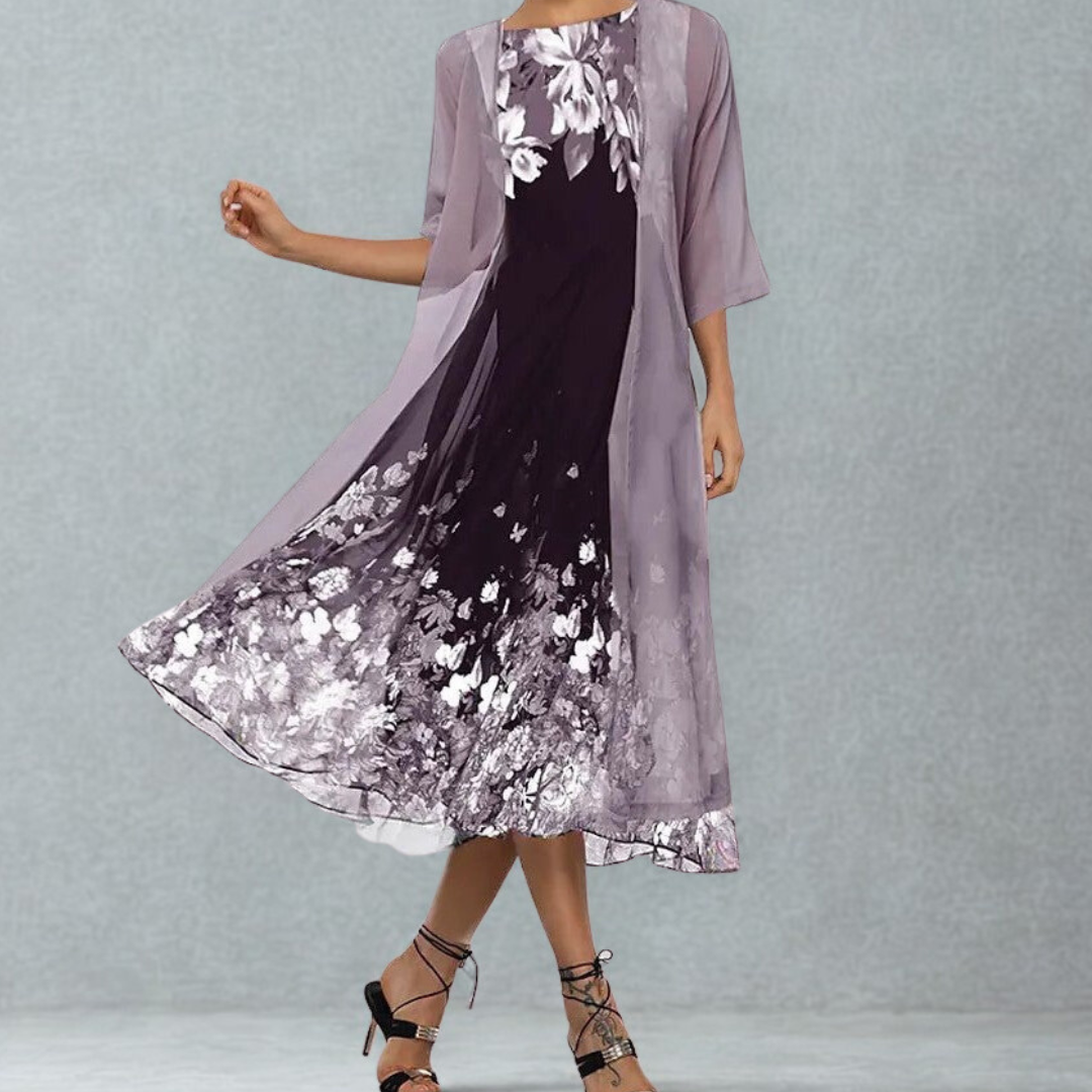 Women's A-line floral midi dress with 3/4 sleeves & round neck, perfect for elegant spring & summer casual wear.