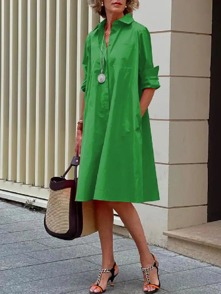 Stylish women's button-front A-line midi dress. Effortlessly chic long-sleeve shirt dress, perfect for any casual occasion.