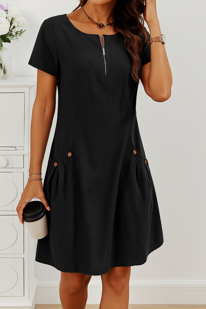 Lightweight & comfortable women's summer midi dress, styled with charming button details and a graceful A-line shape.