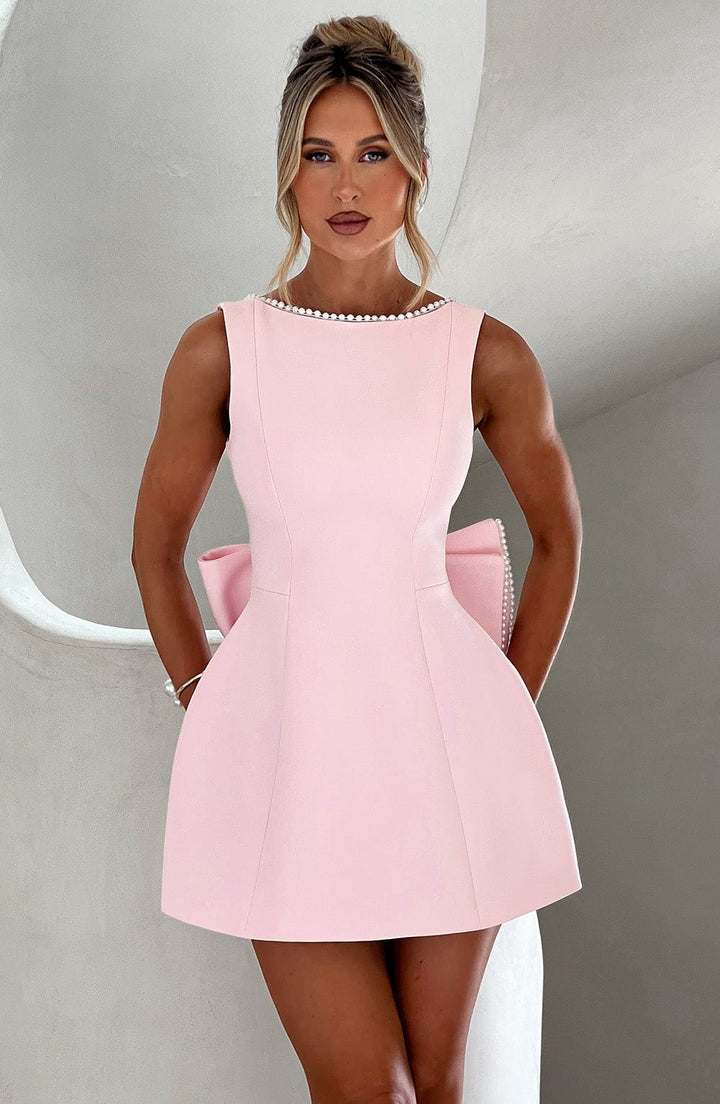 Women's A-line mini homecoming dress with elegant pearl trim.